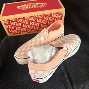 Pink checker slip on Vans